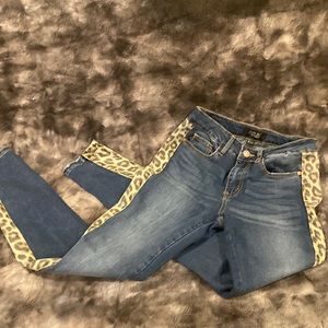 Adorable Judy Blue skinny jeans. Cheetah print going down both legs. Size 27/5.